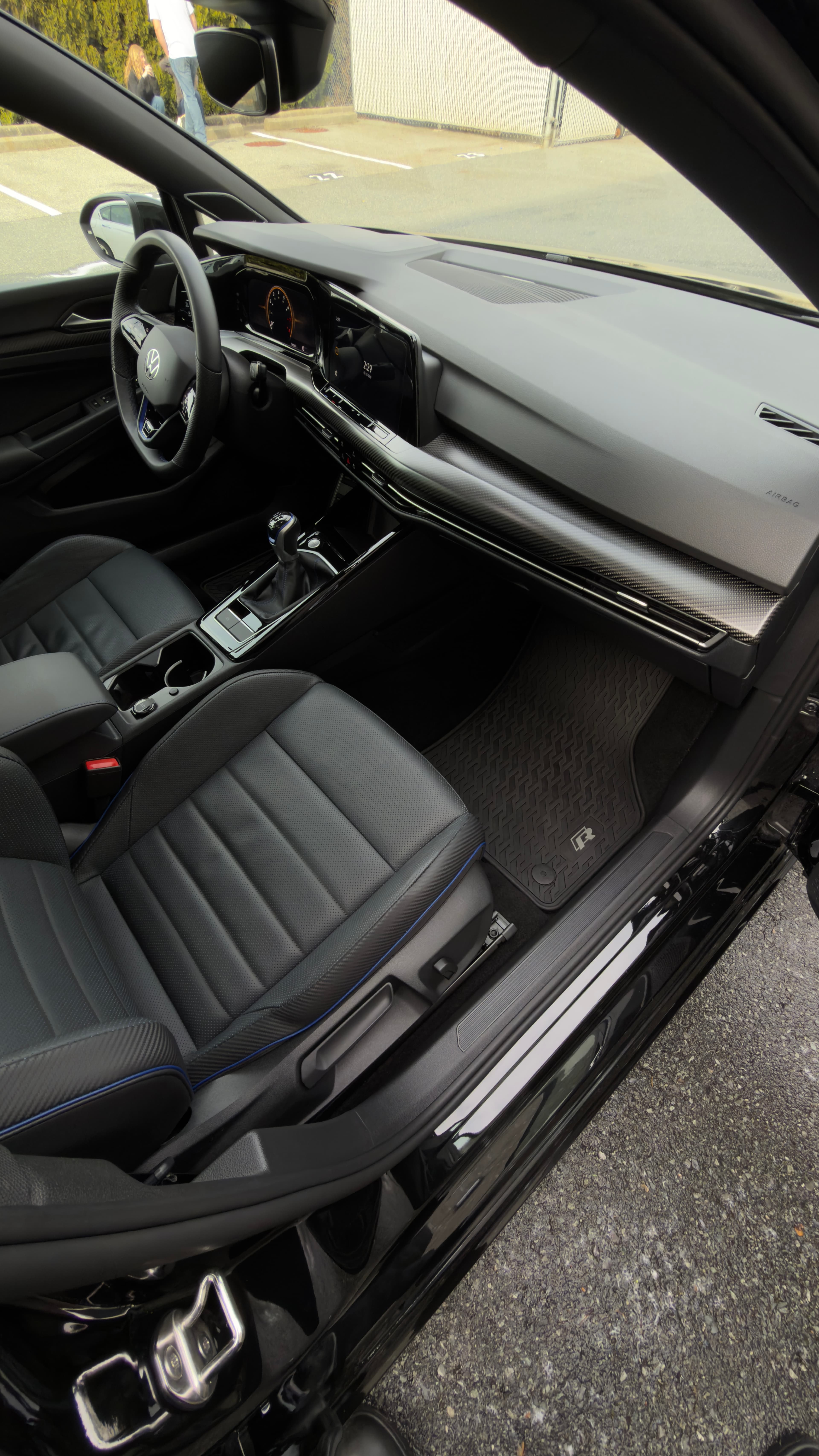 Detailed dashboard, console, and carpets — full interior detailing result in Vancouver