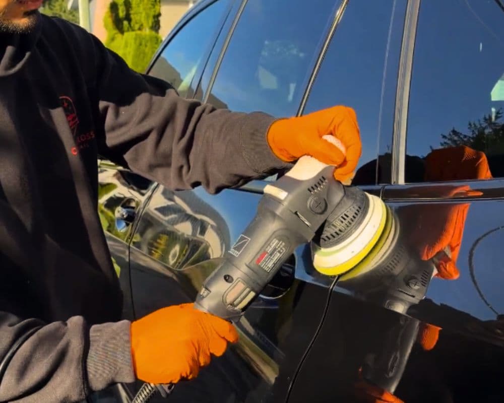 Paint correction being performed on a vehicle in Metro Vancouver — local conditions accelerate clear coat damage