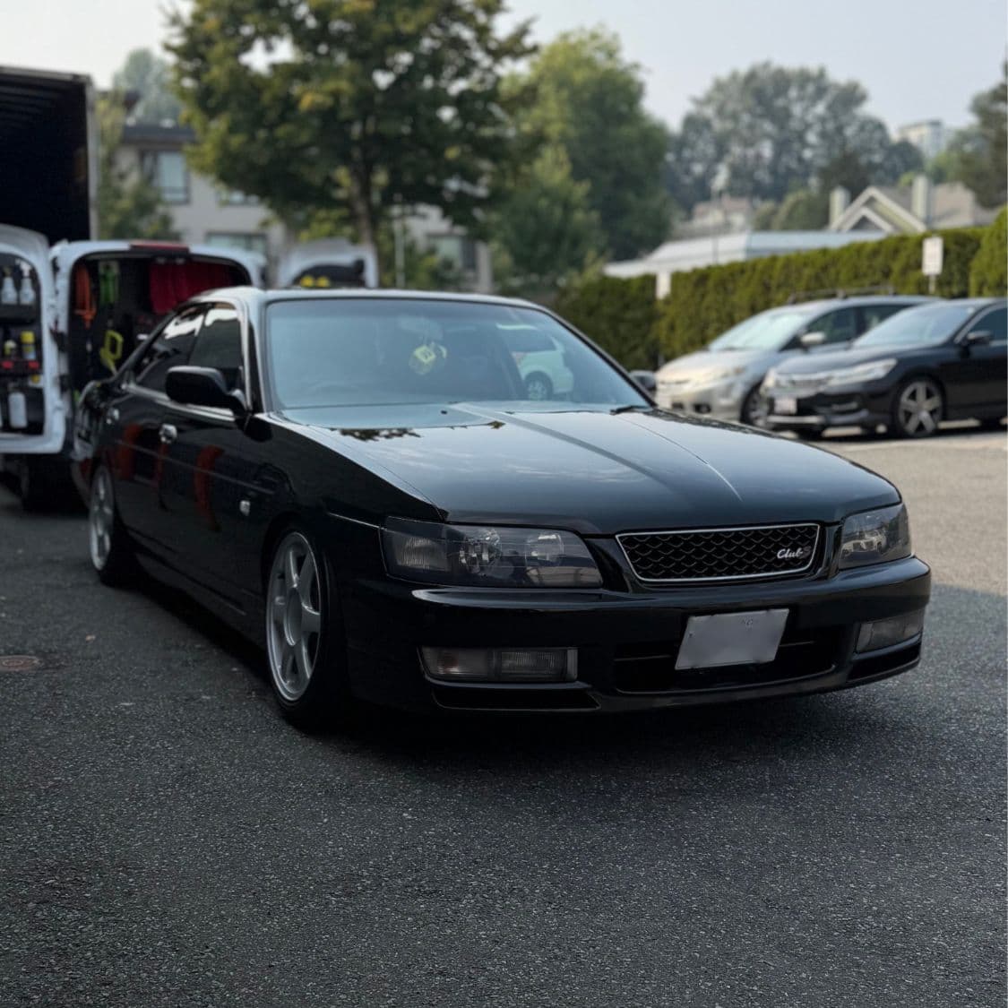 Black car after professional paint polishing and correction in Vancouver by Crystal Gloss Auto Detail