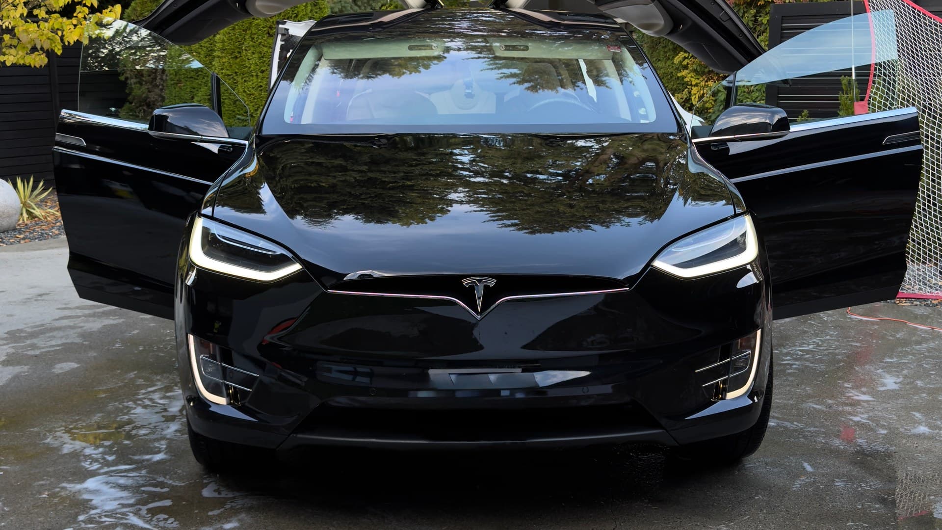 Black Tesla Model X after mobile ceramic coating detailing in Vancouver by Crystal Gloss Auto Detail